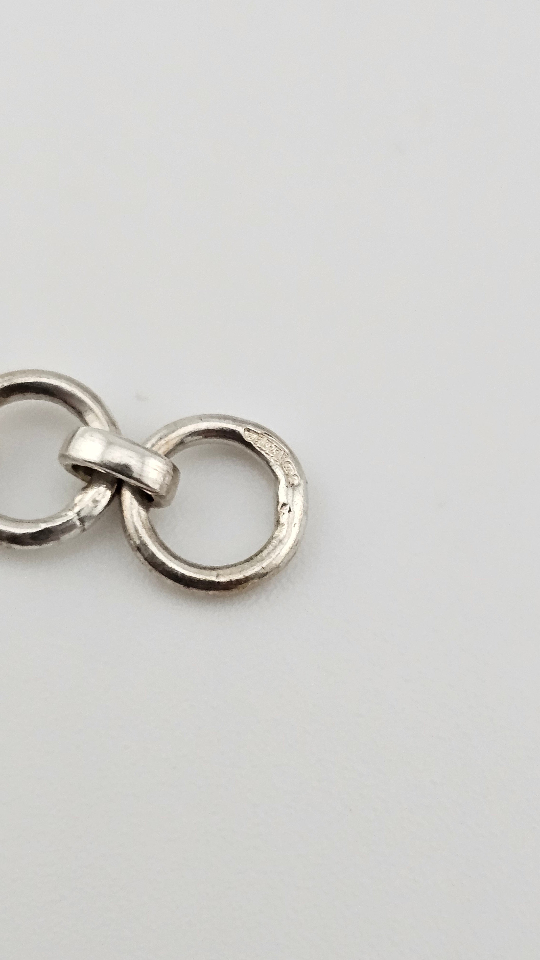 925 sterling silver daisy link bracelet featuring light blue, round cabochon aquamarine