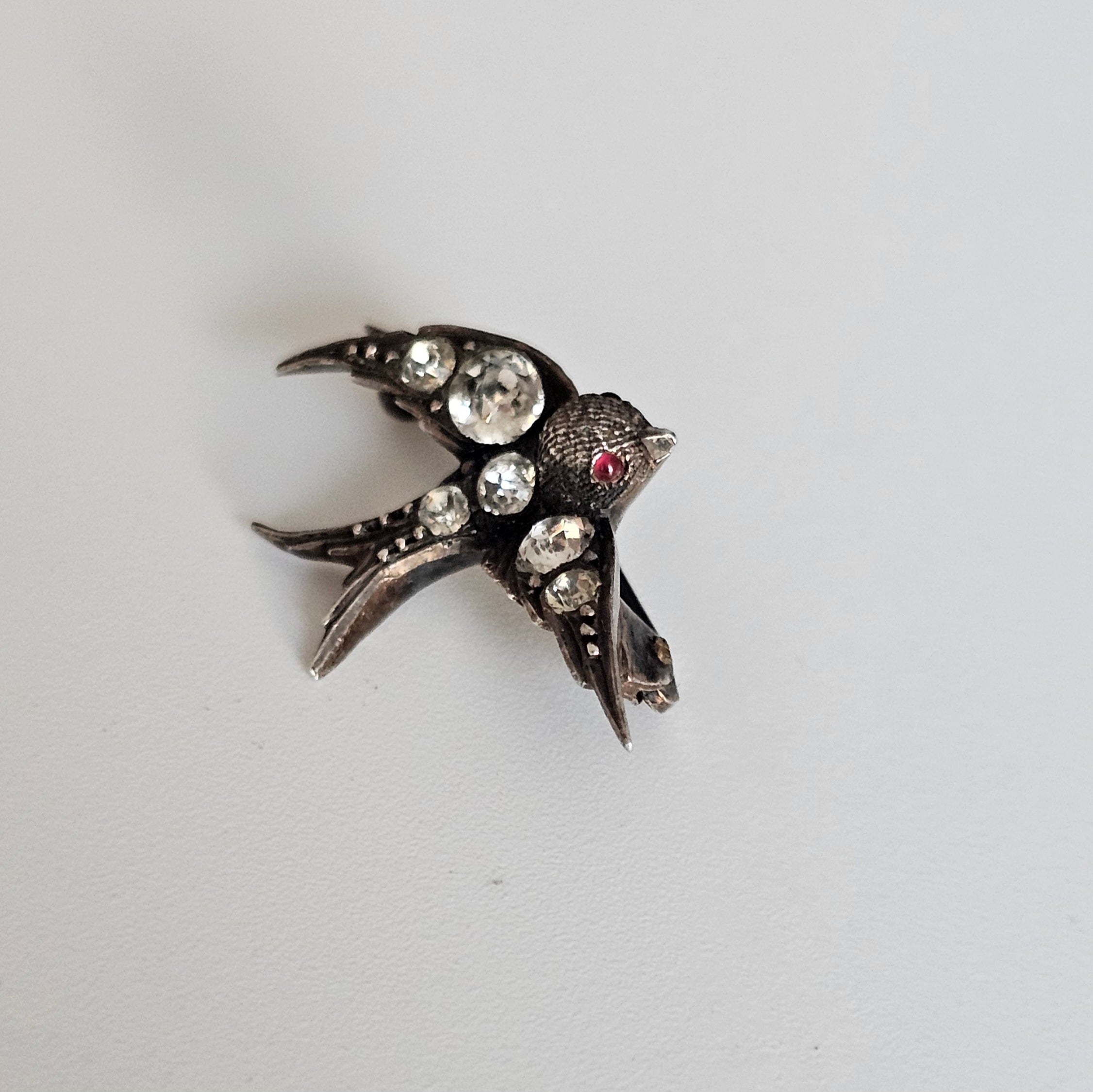Antique Victorian Silver Paste Swallow Bird Brooch with a Red Paste Eyes