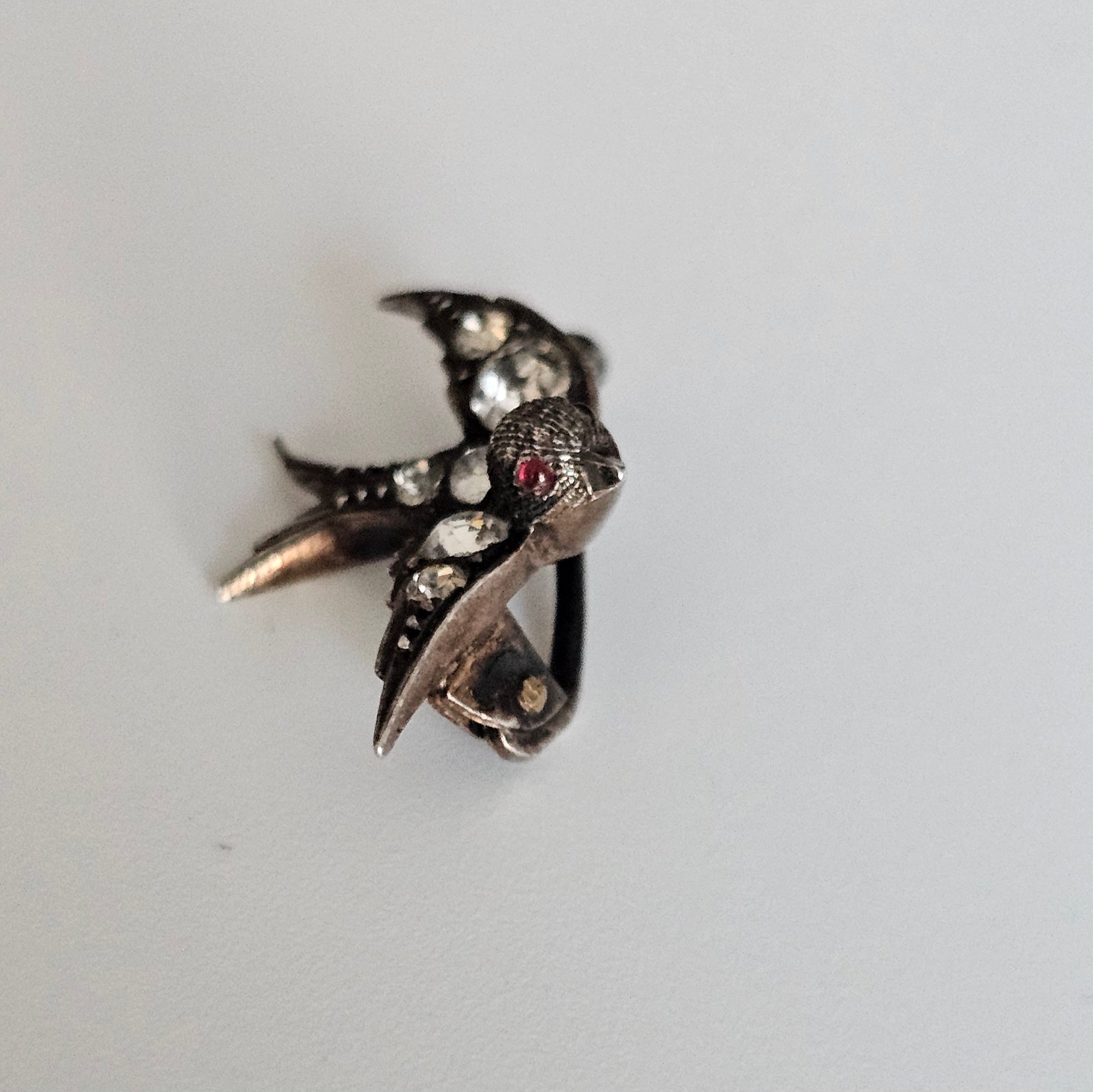 Antique Victorian Silver Paste Swallow Bird Brooch with a Red Paste Eyes