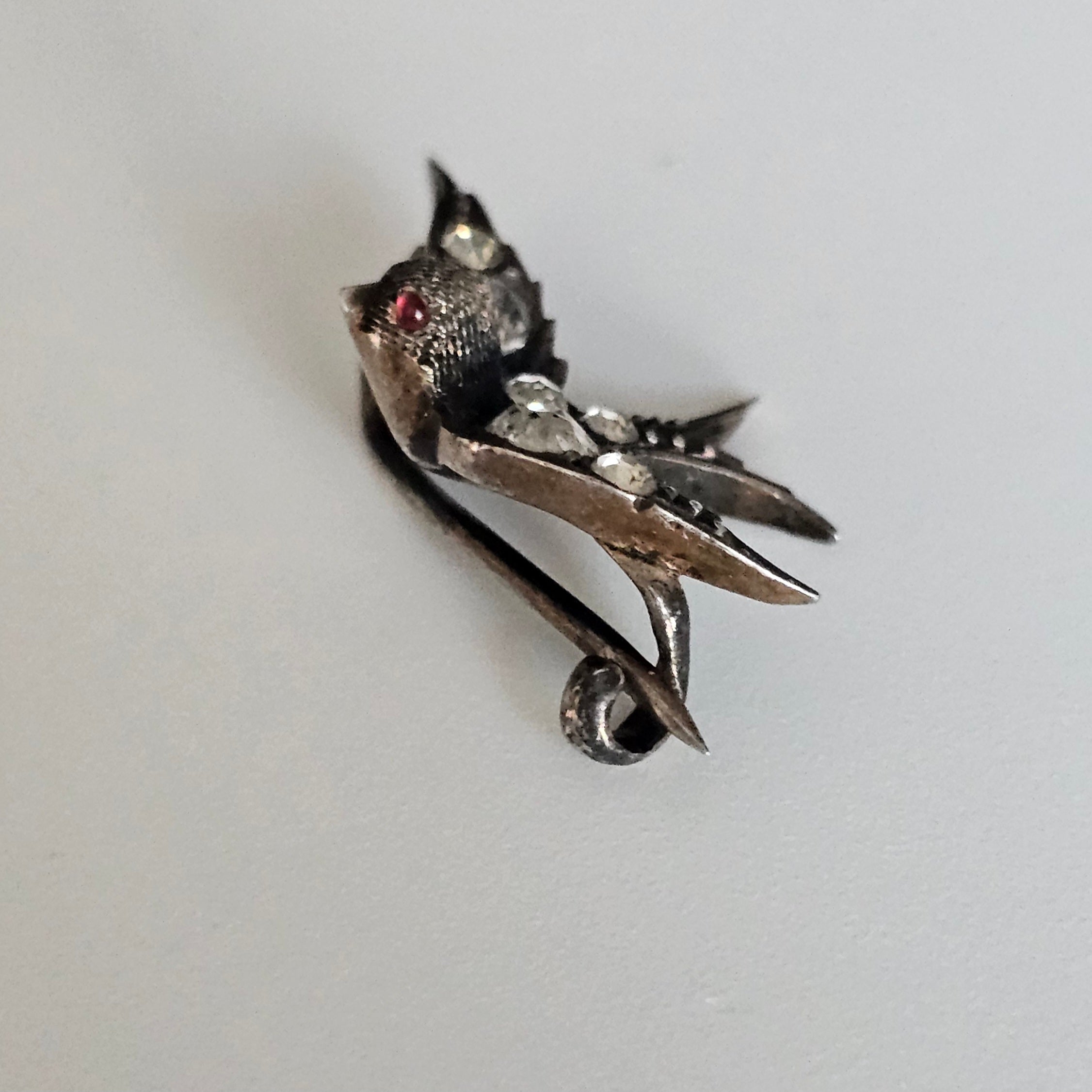 Antique Victorian Silver Paste Swallow Bird Brooch with a Red Paste Eyes