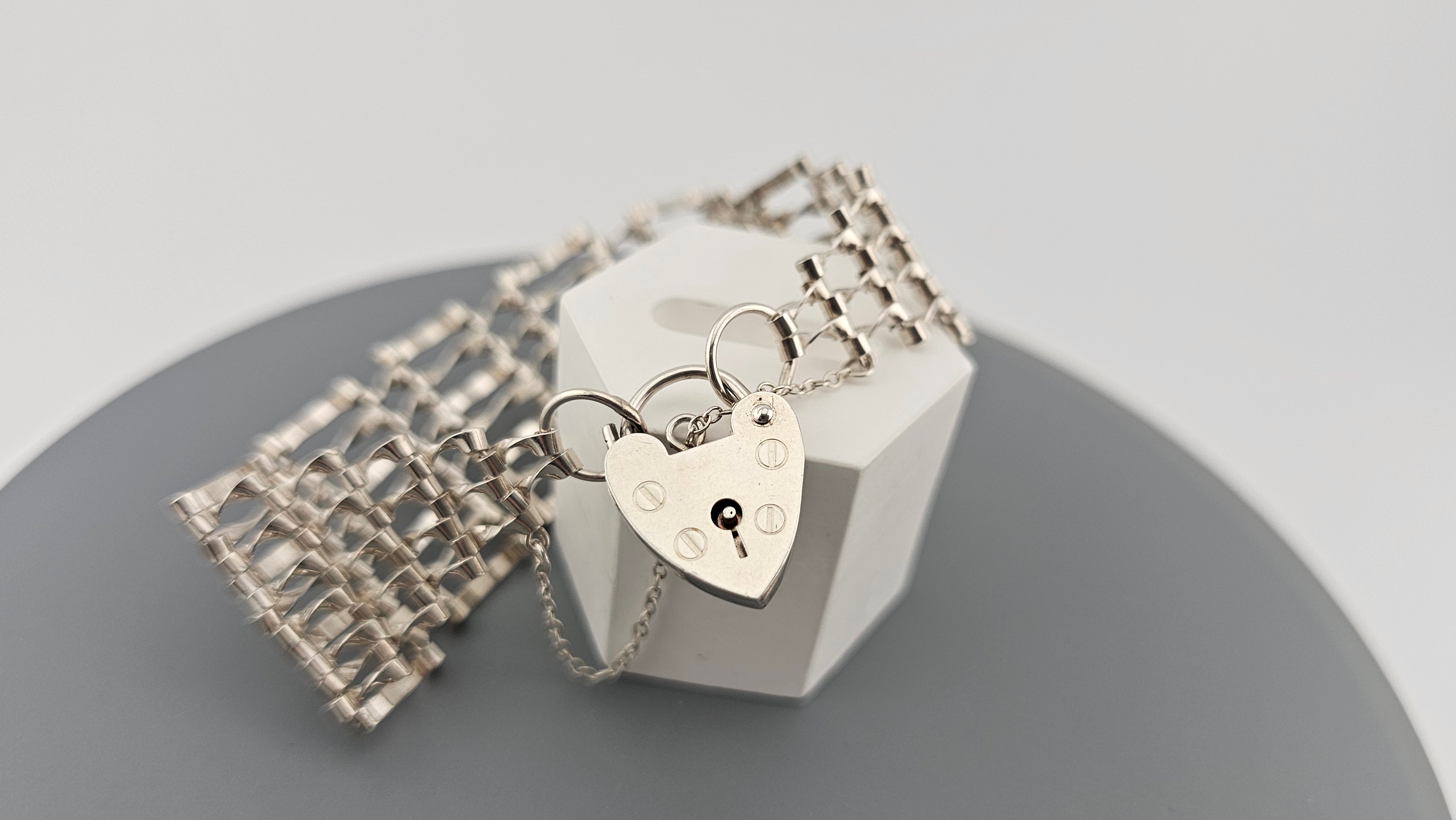 Vintage 925 Sterling Silver Gate Bracelet Featuring Heart Padlock Clasp