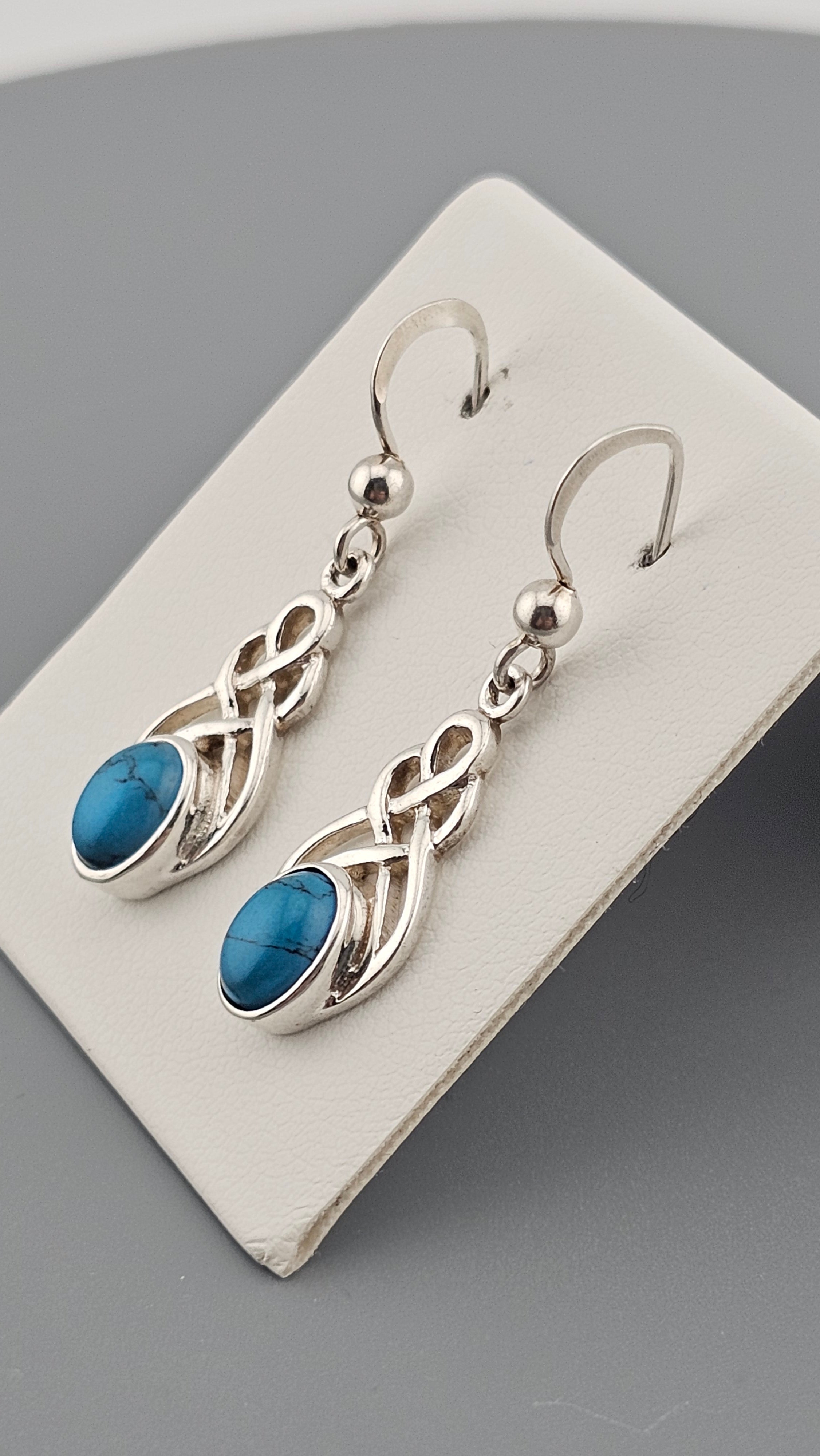 Sterling Silver Celtic Knot Drop Earrings with Turquoise stones.