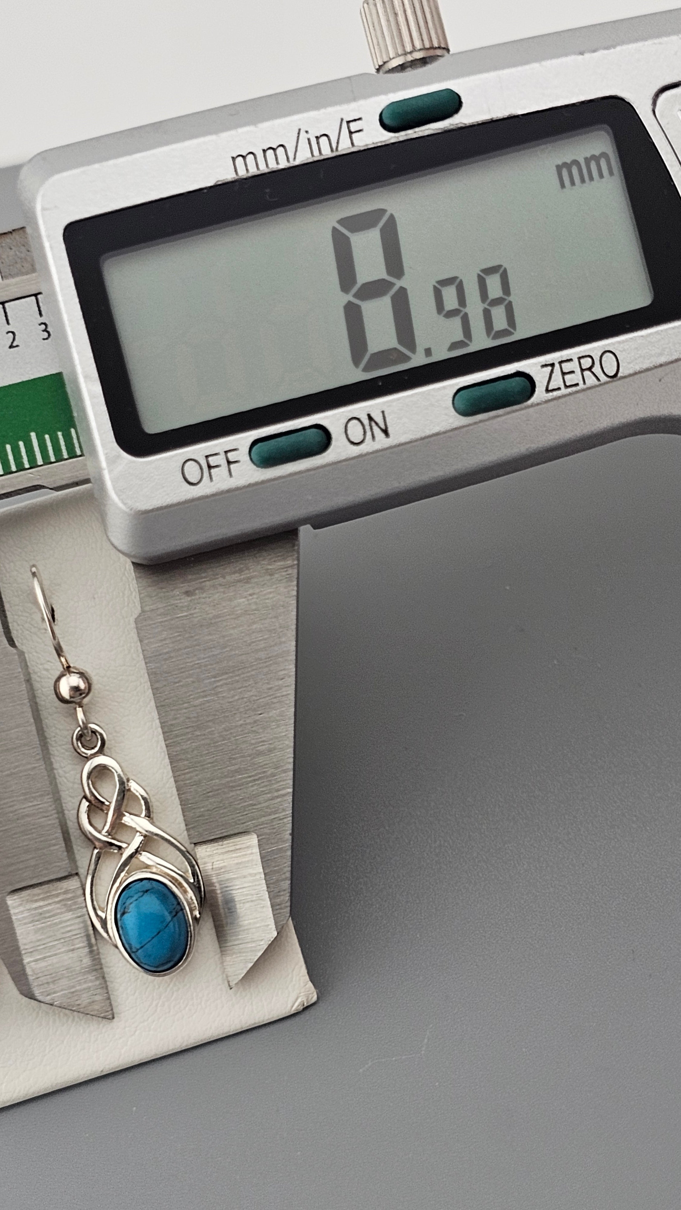 Sterling Silver Celtic Knot Drop Earrings with Turquoise stones.