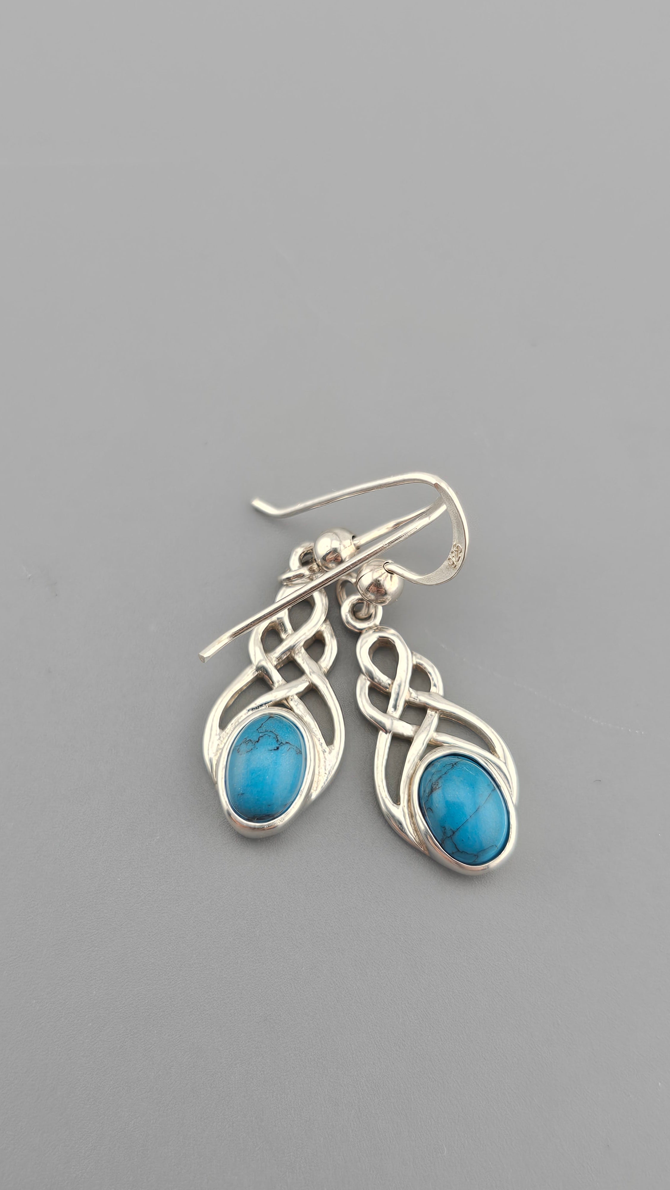 Sterling Silver Celtic Knot Drop Earrings with Turquoise stones.
