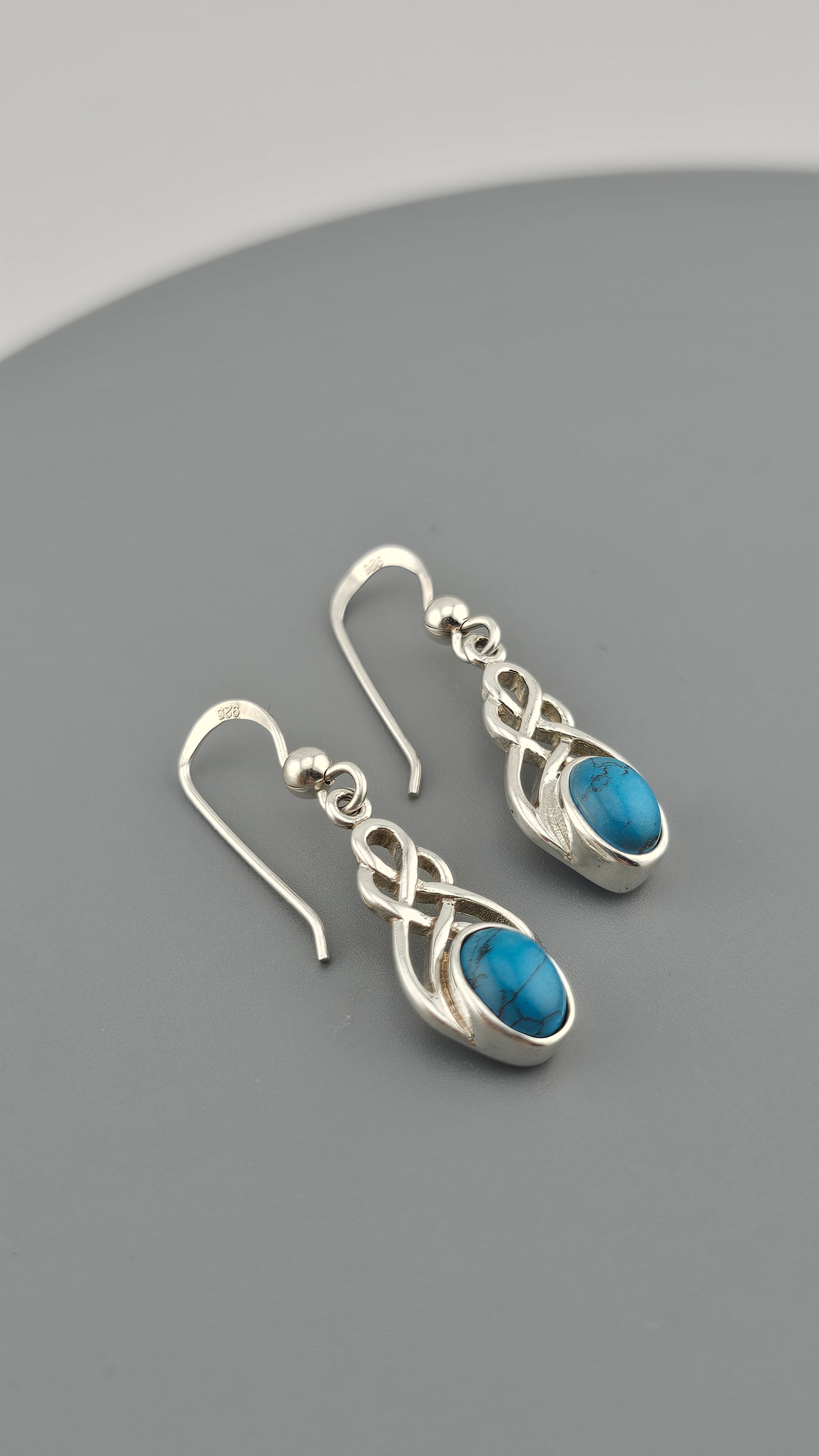 Sterling Silver Celtic Knot Drop Earrings with Turquoise stones.