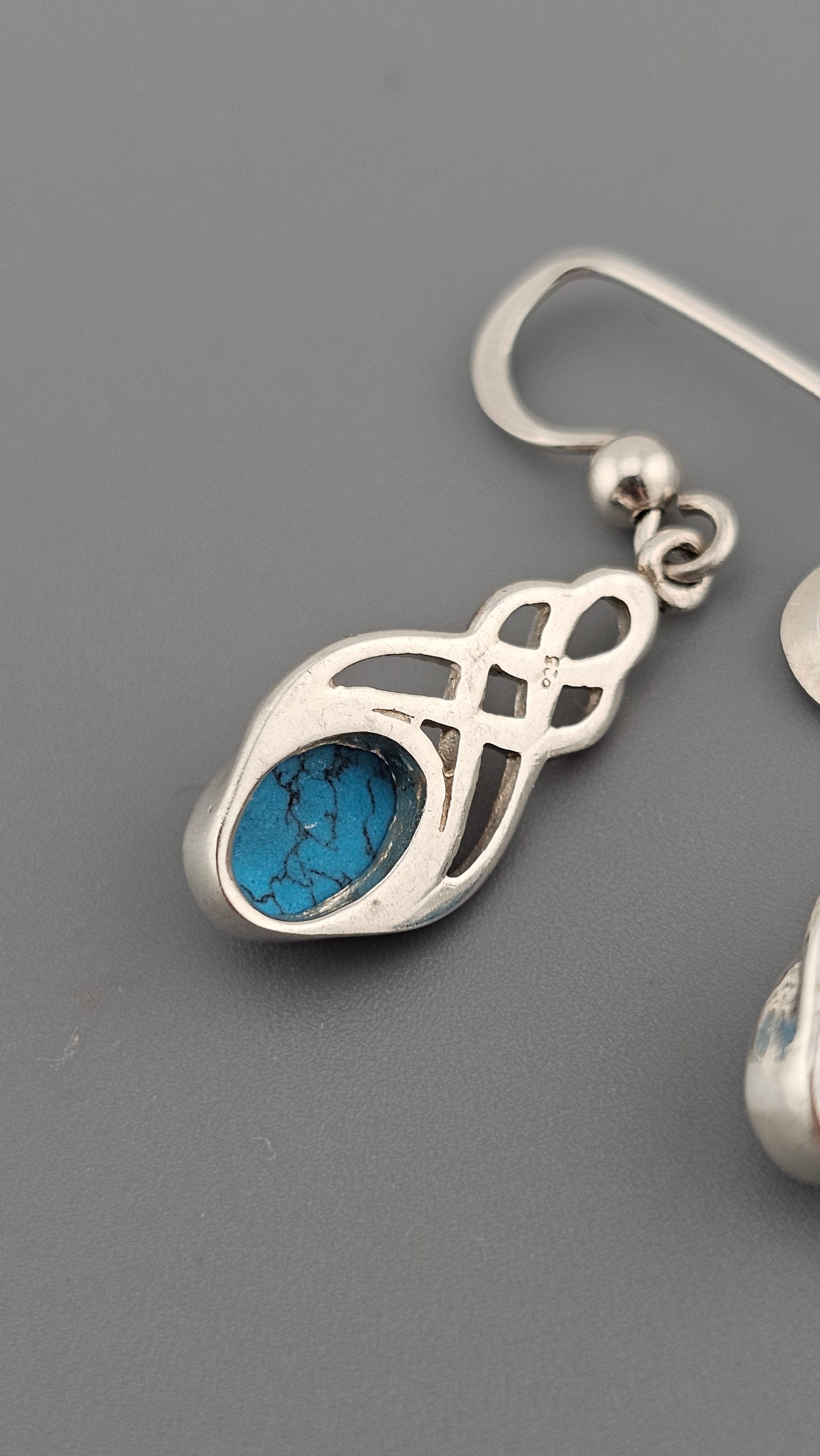 Sterling Silver Celtic Knot Drop Earrings with Turquoise stones.