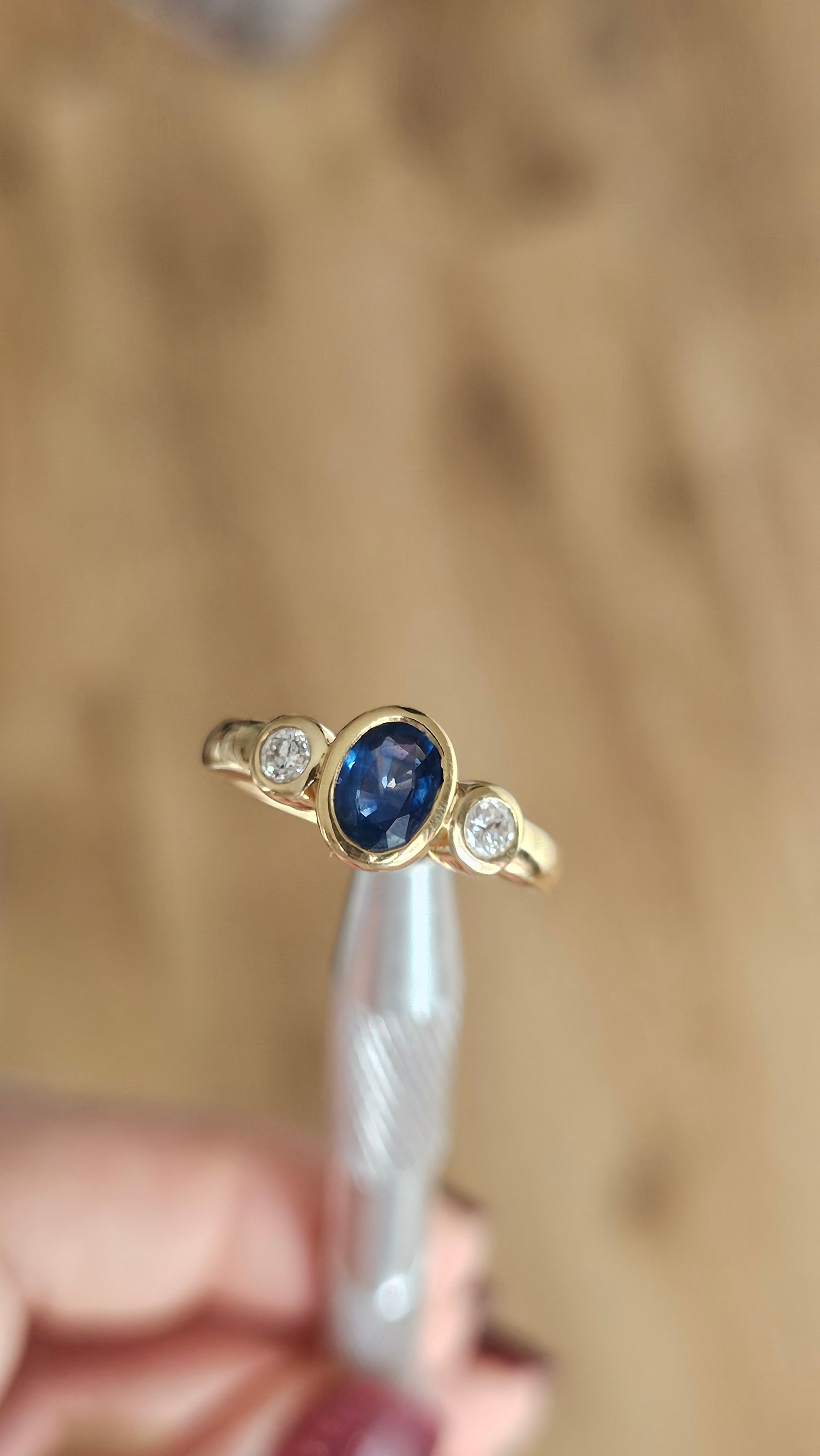 Bezel set 0.85ct Natural Sapphire and 0.20ct Natural Diamonds in 18ct Yellow Gold ring