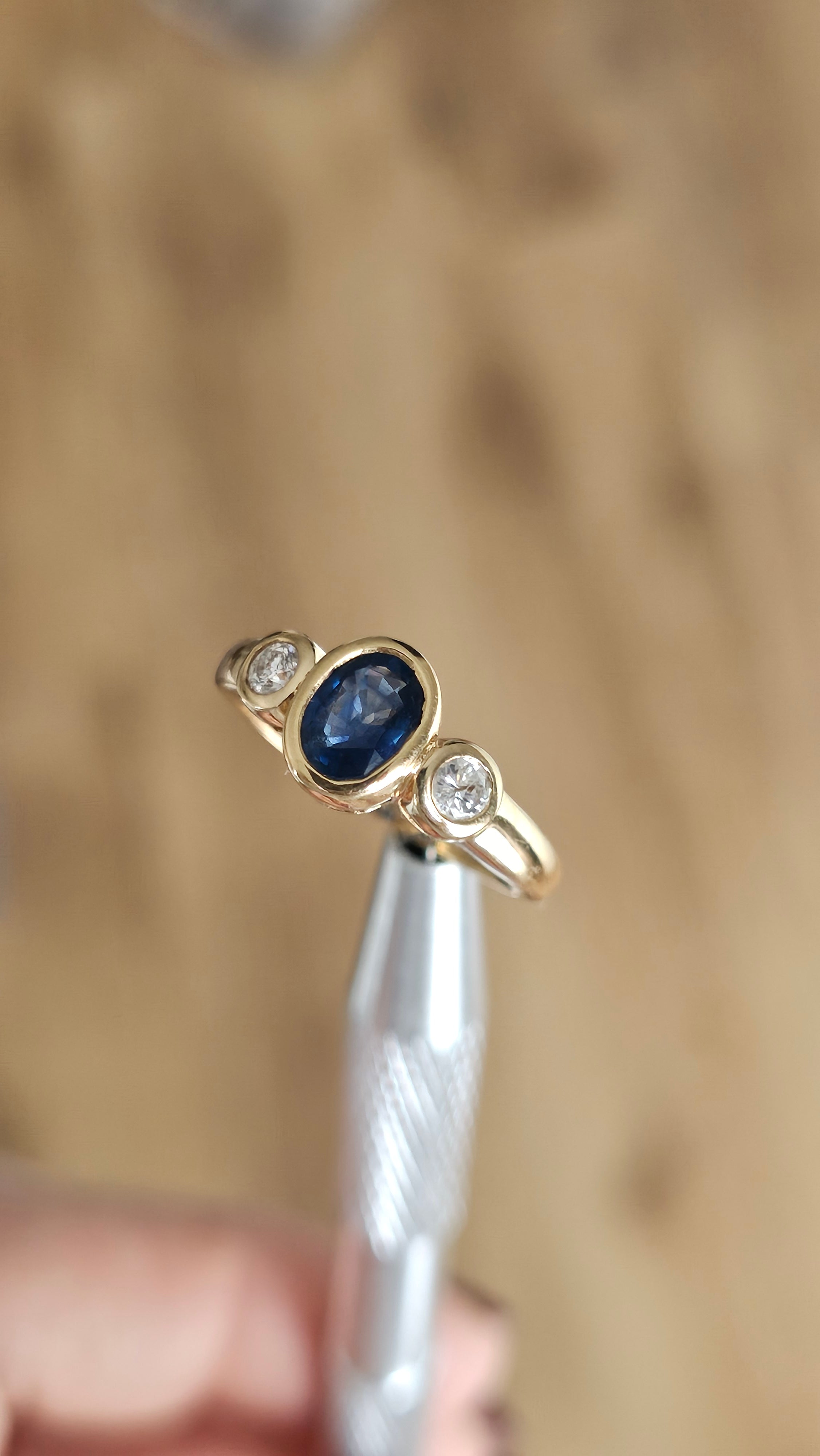 Bezel set 0.85ct Natural Sapphire and 0.20ct Natural Diamonds in 18ct Yellow Gold ring
